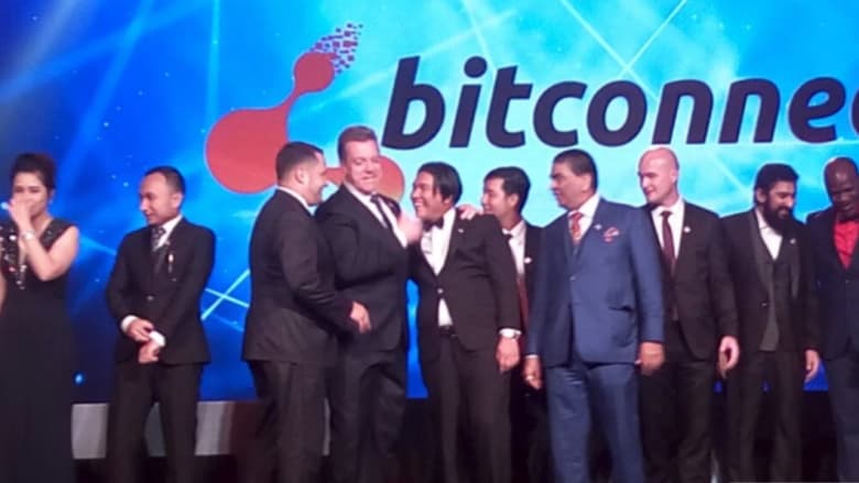 John Bigatton (fourth from left) at a BitConnect conference